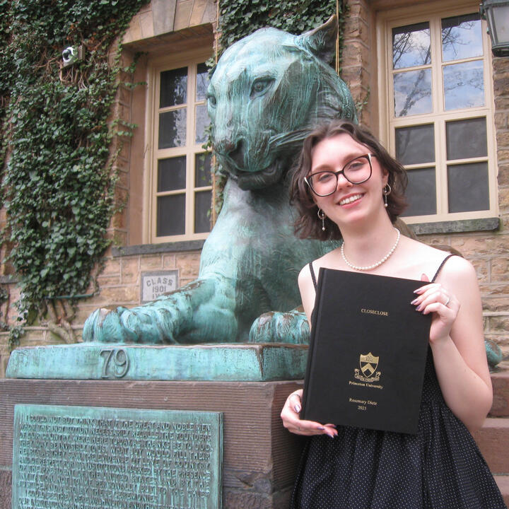 A pink bubblegum bubble encasing a teal typewriter.